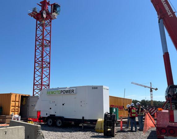 Crane-set mobilization of a Remote Power unit on a construction site